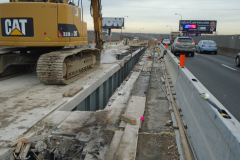 January 2020 - Workers remove a section of the bridge's existing concrete deck.